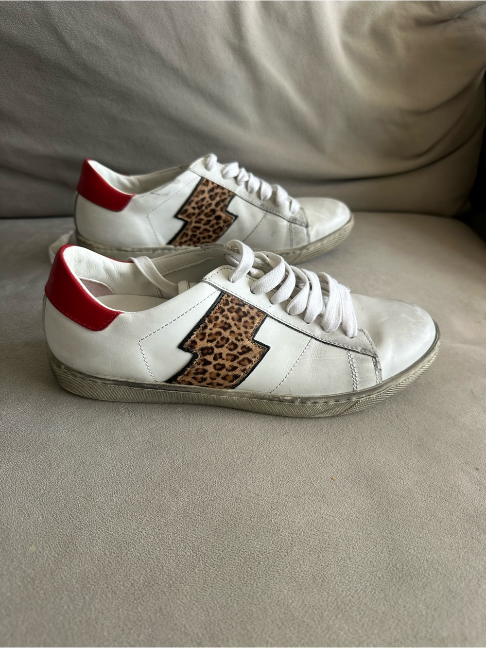 AMIRI White Leather Sneakers with Leopard Lightning Accent and Red Heel Tab